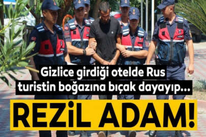 Rus kadının boğazına bıçak dayadı