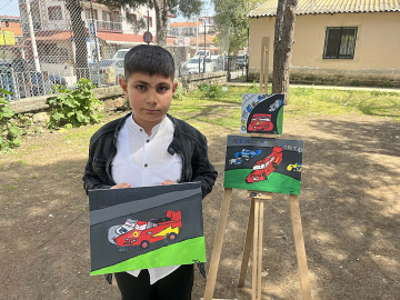 10 yaşındaki otizmli Hasan, ilk resim sergisini açtı