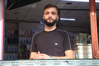 Kepengi aralayıp girdiği iş yerinden 25 cep telefonu çaldı (2) / Video eklendi