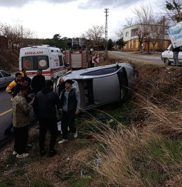 Kontrolünü kaybeden otomobil yamaca çarpıp ters döndü