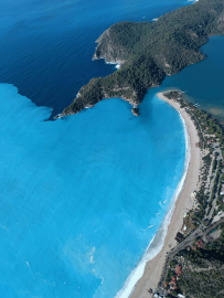 Sağanak sonrası Ölüdeniz'in rengi turkuaza döndü