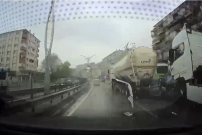 Otomobil, TIR ile tanker arasına sıkıştı; kaza kamerada