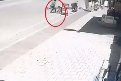 2 yaşındaki çocuğu, sokak ortasında tekmeledi